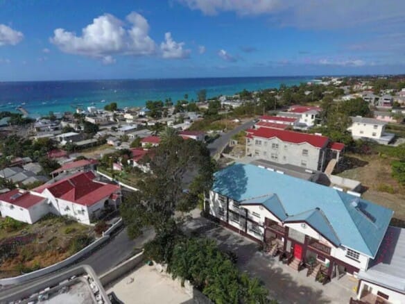 Qlistings - 7 Large Apartments overlooking Oistins Bay Beach – Vale View Maxwell – Airbnb Investment Thumbnail